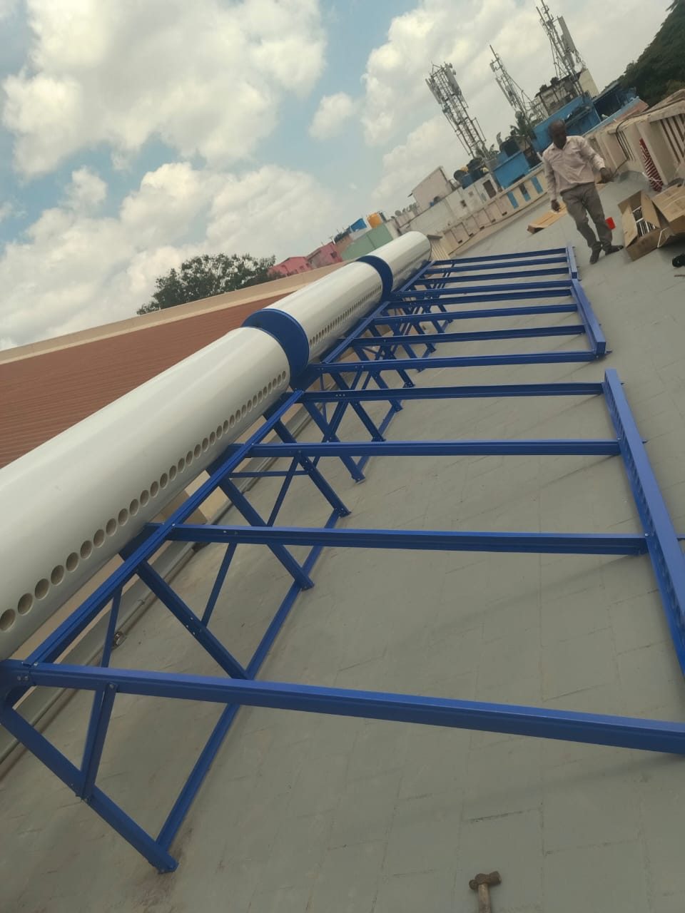 Frame and tank erection for a large solar water heating system
